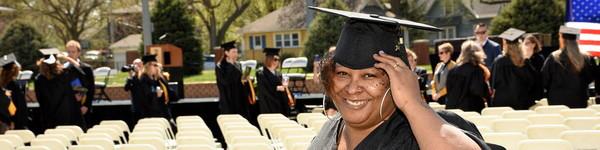 A female master of nursing student at graduation.